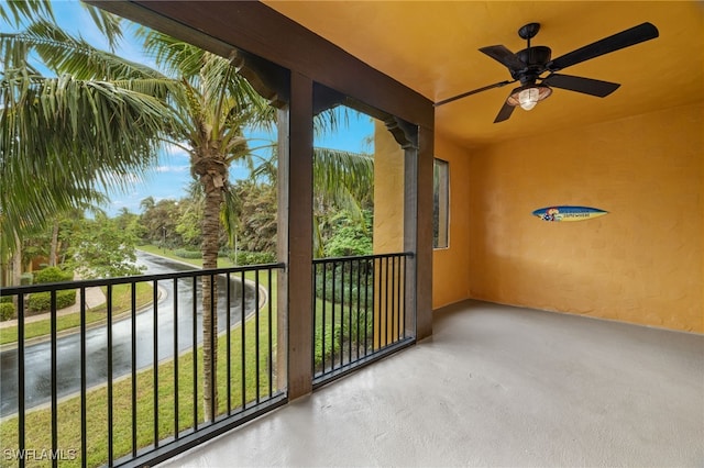 balcony featuring ceiling fan