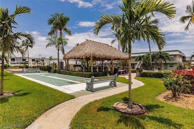 view of community featuring a yard and a gazebo