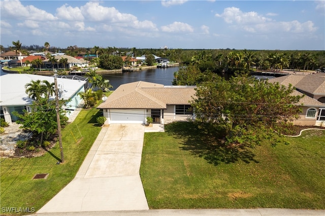 drone / aerial view with a water view