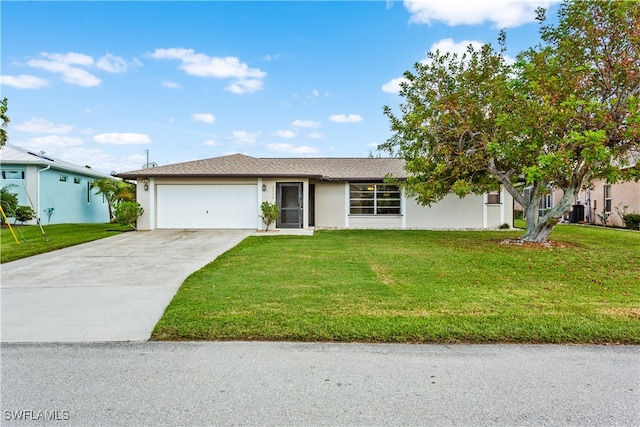 view of front facade featuring a garage and a front lawn