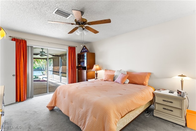 bedroom with access to outside, a textured ceiling, carpet flooring, and ceiling fan