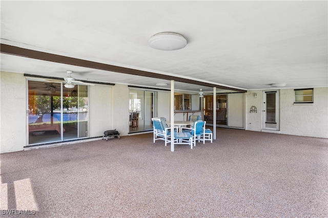 view of patio with ceiling fan