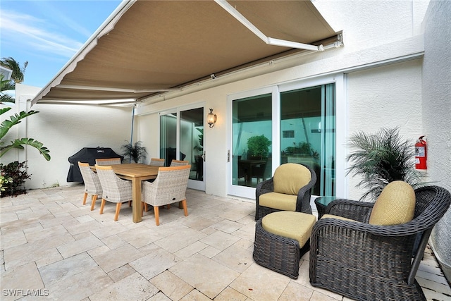 view of patio / terrace featuring a grill