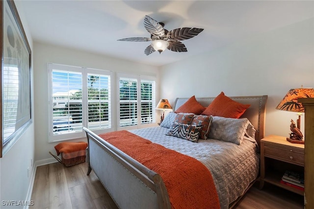 bedroom featuring hardwood / wood-style flooring and ceiling fan