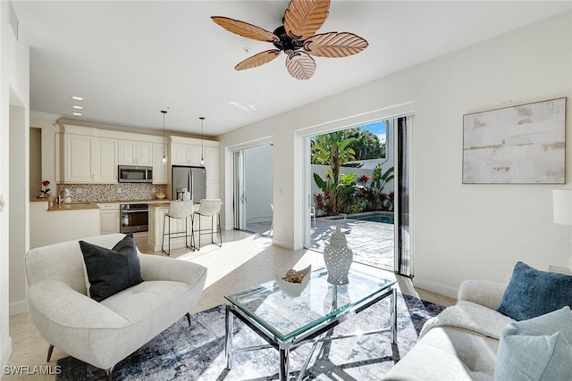 living room with light tile patterned flooring and ceiling fan