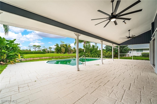 view of pool featuring a patio and ceiling fan