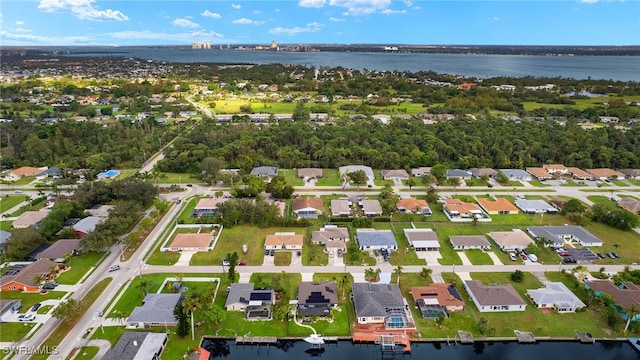 drone / aerial view with a water view