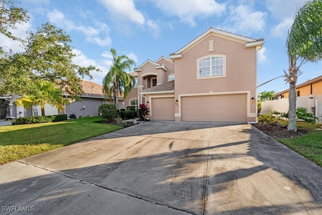 view of front of house with a garage and a front lawn