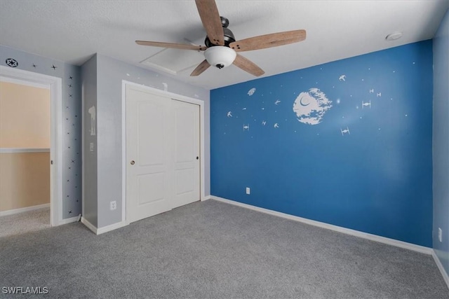 2798 Via Piazza Loop, Fort Myers, FL 33905 - unfurnished bedroom featuring carpet, a closet, and a ceiling fan