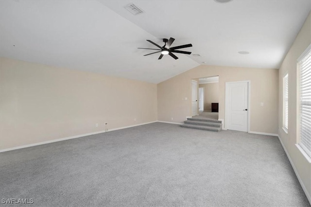 2798 Via Piazza Loop, Fort Myers, FL 33905 - unfurnished living room featuring a ceiling fan, lofted ceiling, carpet flooring, and baseboards