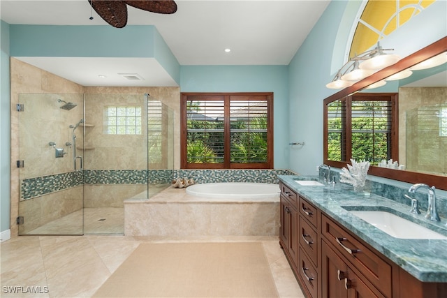 bathroom featuring separate shower and tub, tile patterned floors, plenty of natural light, and vanity