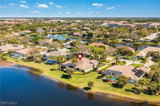 bird's eye view with a water view and a residential view