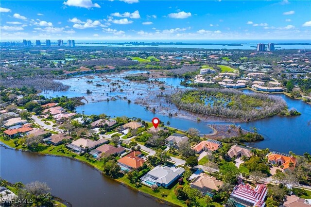 birds eye view of property featuring a residential view and a water view