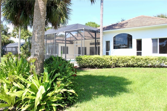 view of yard featuring a lanai