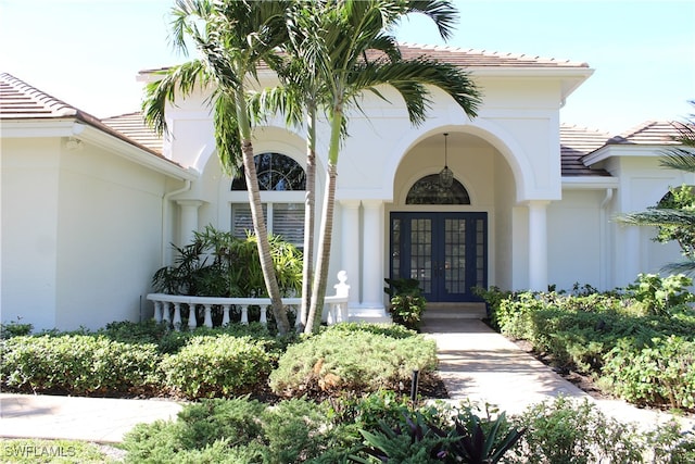 doorway to property featuring french doors