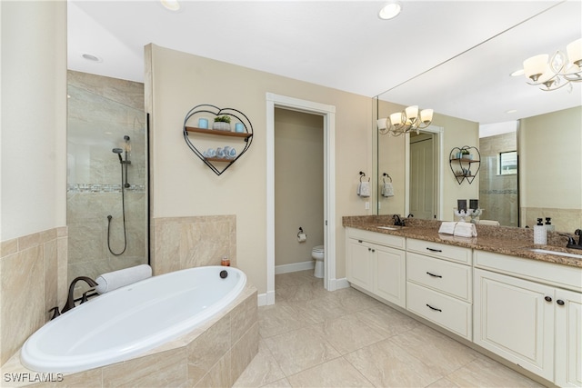 full bathroom with toilet, separate shower and tub, tile patterned flooring, a notable chandelier, and vanity