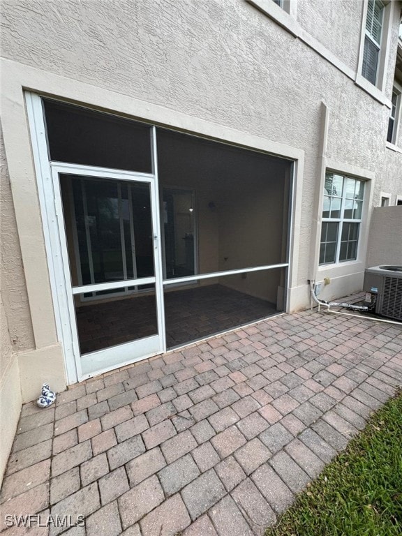 view of patio / terrace with cooling unit