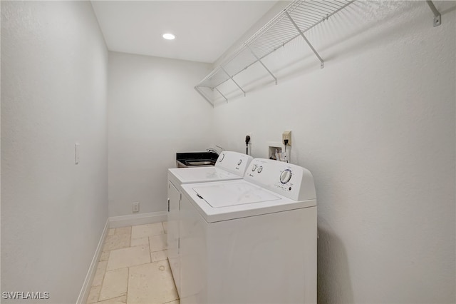 laundry room with washer and clothes dryer