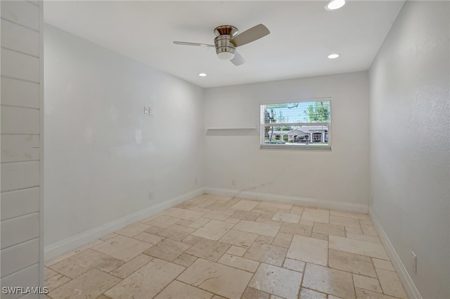 spare room featuring ceiling fan