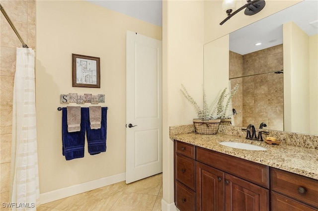 bathroom with a shower with curtain and vanity