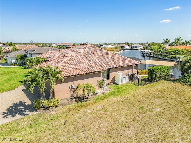 drone / aerial view featuring a water view