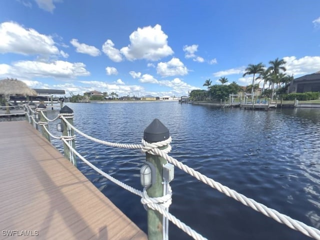 view of dock with a water view