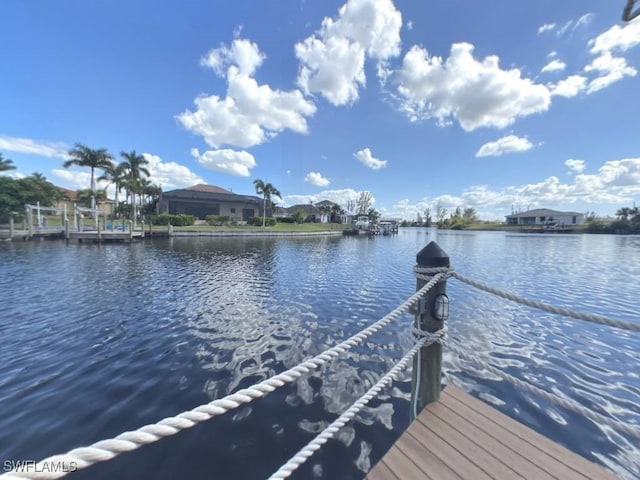 view of dock with a water view