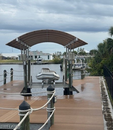 view of dock with a water view