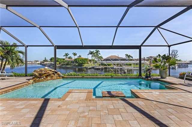 view of pool featuring a patio, a water view, and a lanai