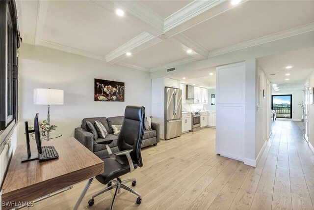 office space featuring light wood-type flooring, coffered ceiling, ornamental molding, and beamed ceiling