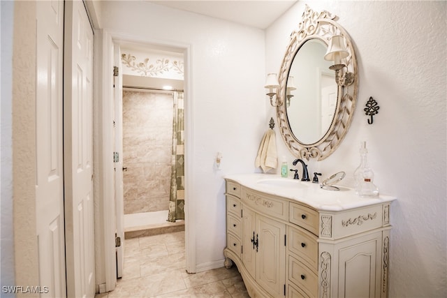 bathroom featuring vanity and a shower with shower curtain