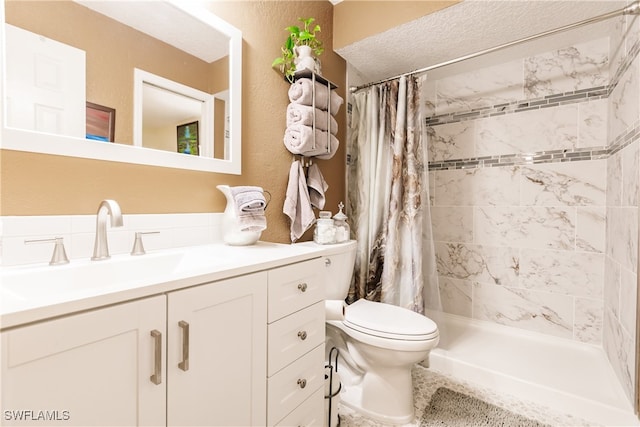 bathroom featuring vanity, toilet, and a shower with curtain