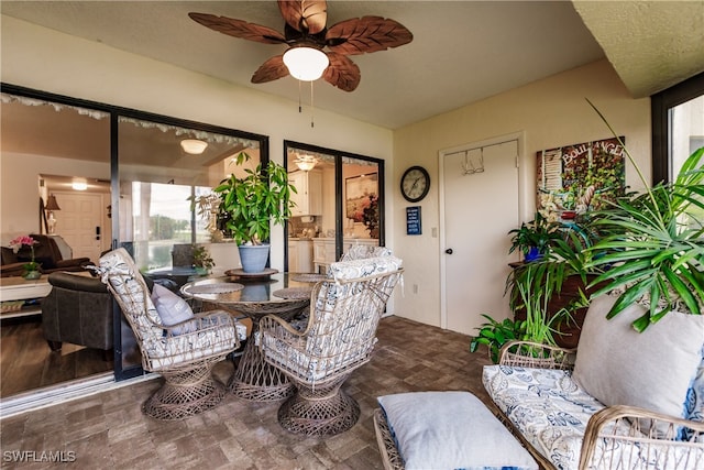 interior space featuring ceiling fan