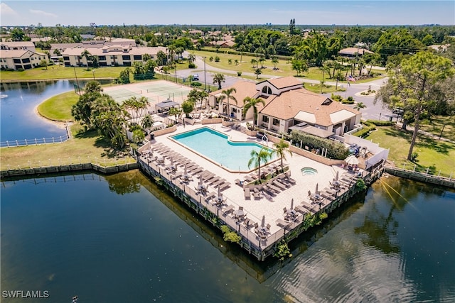 bird's eye view with a water view