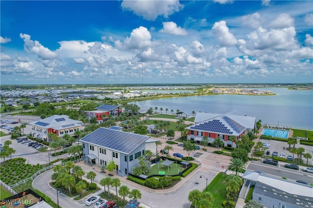 bird's eye view with a water view