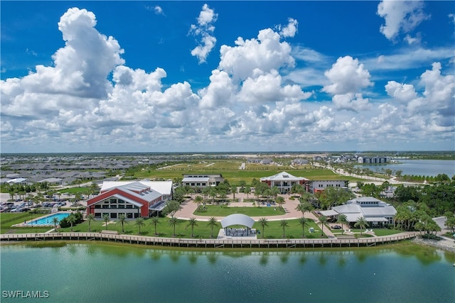 birds eye view of property featuring a water view