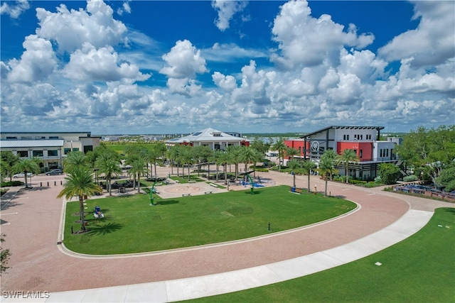 surrounding community featuring a lawn