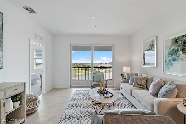 living room featuring light tile patterned floors