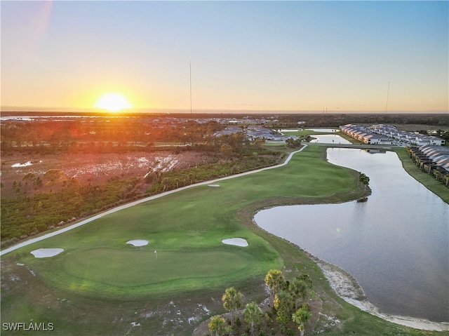 surrounding community with a water view