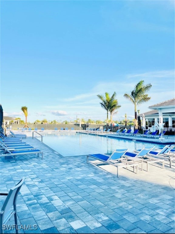 view of pool featuring a patio area