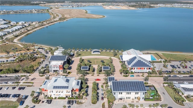 birds eye view of property featuring a water view