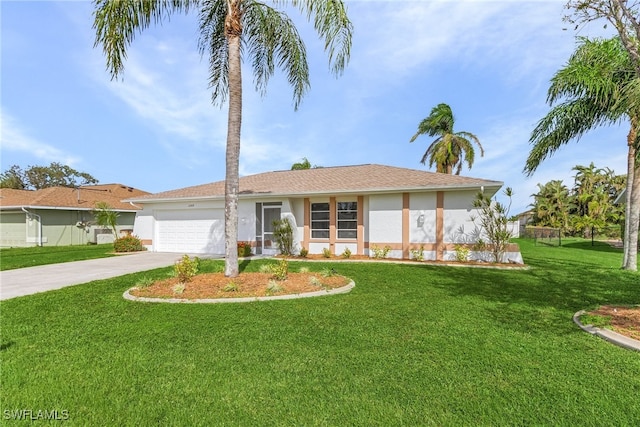 single story home featuring a garage and a front yard