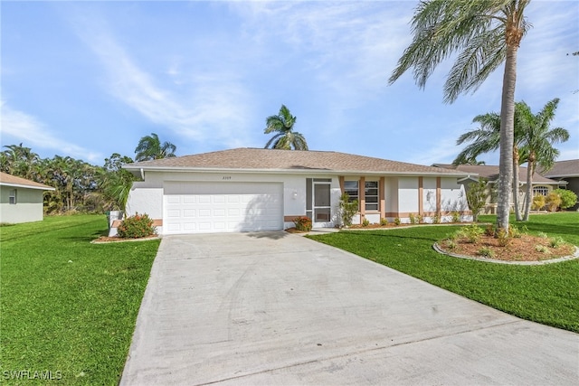 single story home featuring a garage and a front lawn