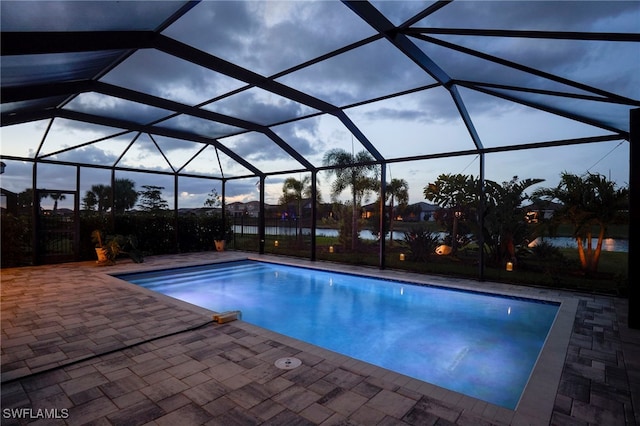 view of pool with a lanai and a patio area