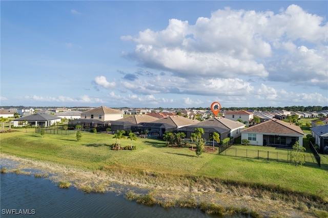 bird's eye view with a water view