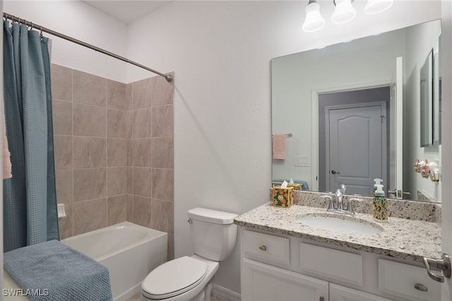 full bathroom featuring vanity, shower / bath combo, and toilet