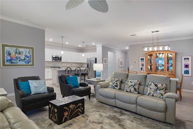 living room with ornamental molding