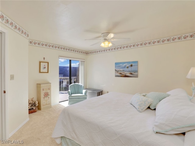 bedroom featuring ceiling fan, access to exterior, and light colored carpet