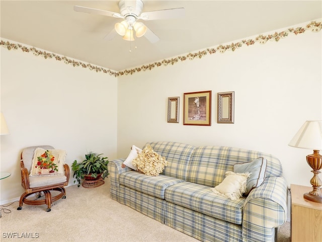 carpeted living room featuring ceiling fan