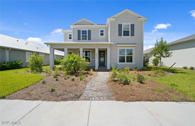 42202 Lake Timber Dr, Punta Gorda, FL 33982 - view of front facade featuring a porch